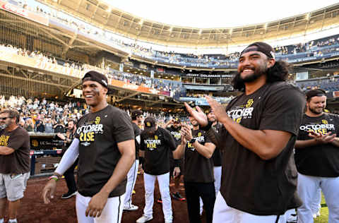 SAN DIEGO, CA - OCTOBER 2: Juan Soto #22 of the San Diego Padres (L) and Sean Manaea #55 celebrate (Photo by Denis Poroy/Getty Images)