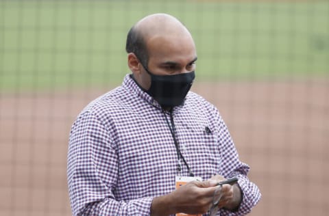 SAN FRANCISCO, CALIFORNIA - AUGUST 26: San Francisco Giants President of Baseball Operations, Farhan Zaidi, talks on the phone. (Photo by Lachlan Cunningham/Getty Images)