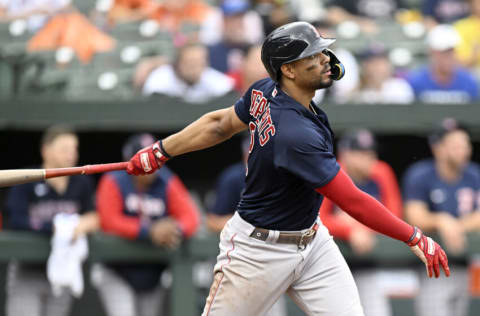 BALTIMORE, MARYLAND - SEPTEMBER 11: Xander Bogaerts #2 of the Boston Red Sox bats against the Baltimore Orioles (Photo by G Fiume/Getty Images)