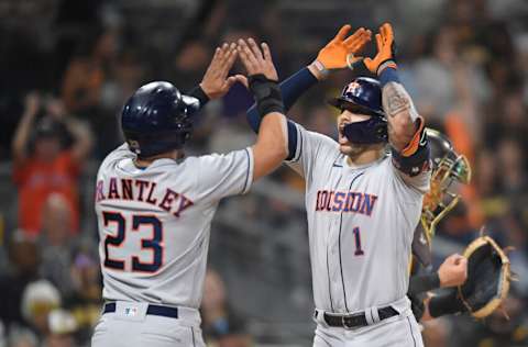 SAN DIEGO, CA - SEPTEMBER 3: Carlos Correa #1 of the Houston Astros is congratulated by Michael Brantley #23 after hitting a three-run home run (Photo by Denis Poroy/Getty Images)