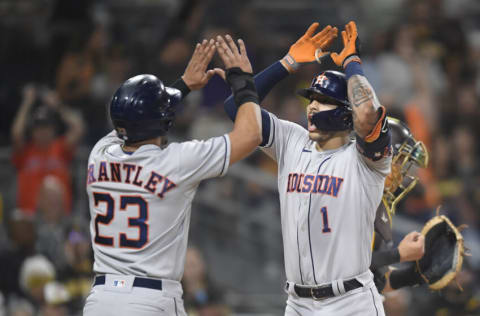 SAN DIEGO, CA - SEPTEMBER 3: Carlos Correa #1 of the Houston Astros is congratulated by Michael Brantley #23 after hitting a three-run home run (Photo by Denis Poroy/Getty Images)