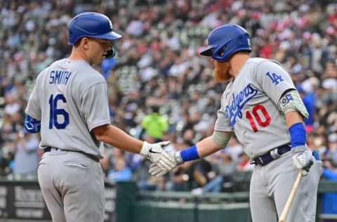 CHICAGO, ILLINOIS - JUNE 08: Justin Turner #10 of the Los Angeles Dodgers congratulates Will Smith #16 for his two-run home run in the first inning against the Chicago White Sox at Guaranteed Rate Field on June 08, 2022 in Chicago, Illinois. (Photo by Quinn Harris/Getty Images)