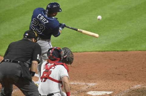 Jul 24, 2021; Cleveland, Ohio, USA; Tampa Bay Rays designated hitter Nelson Cruz (23) flies out against the Cleveland Indians in the ninth inning at Progressive Field. Mandatory Credit: David Richard-USA TODAY Sports