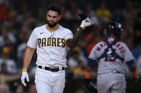 Sep 3, 2021; San Diego, California, USA; San Diego Padres first baseman Eric Hosmer (left) tosses his helmet after striking out to end the seventh inning against the Houston Astros at Petco Park. Mandatory Credit: Orlando Ramirez-USA TODAY Sports