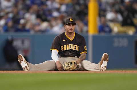 Sep 29, 2021; Los Angeles, California, USA; San Diego Padres third baseman Manny Machado (13) reacts against the Los Angeles Dodgers at Dodger Stadium. Mandatory Credit: Kirby Lee-USA TODAY Sports