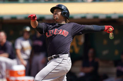 Jul 18, 2021; Oakland, California, USA; Cleveland Indians third baseman Jose Ramirez (11) bats during the eighth inning against the Oakland Athletics at RingCentral Coliseum. Mandatory Credit: Darren Yamashita-USA TODAY Sports