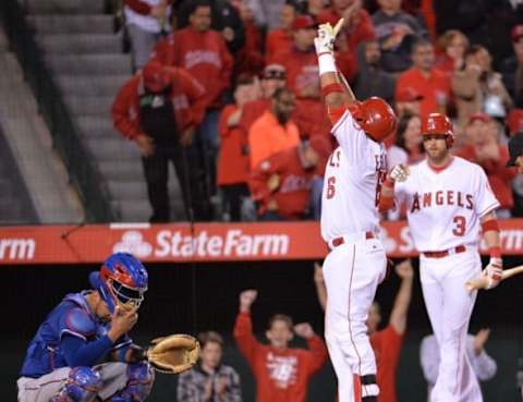 Yunel Escobar celebrates after hitting his first home run of the season for the Angels. He went 2for 4 with two RBI’s. Mandatory Credit: Kirby Lee-USA TODAY Sports