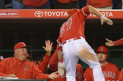 Mike Scioscia has kept his and the team’s spirits up despite all the injuries and tough losses. Jayne Kamin-Oncea-USA TODAY Sports