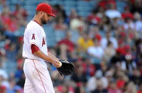 August 4, 2016; Anaheim, CA, USA; Los Angeles Angels starting pitcher Ricky Nolasco (47) reacts after giving up a run on a wild pitch in the fourth inning against Oakland Athletics at Angel Stadium of Anaheim. Mandatory Credit: Gary A. Vasquez-USA TODAY Sports