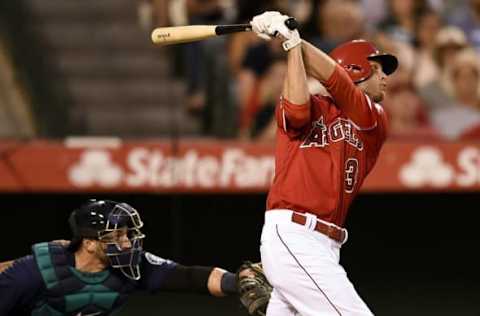 Aug 15, 2016; Anaheim, CA, USA; Los Angeles Angels left fielder Nick Buss (3) follows through on a swing for an RBI double against the Seattle Mariners during the second inning at Angel Stadium of Anaheim. Mandatory Credit: Kelvin Kuo-USA TODAY Sports