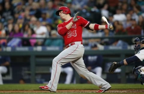 Sep 3, 2016; Seattle, WA, USA; Los Angeles Angels first baseman C.J. Cron (24) hits a double against the Seattle Mariners during the fourth inning at Safeco Field. Mandatory Credit: Joe Nicholson-USA TODAY Sports