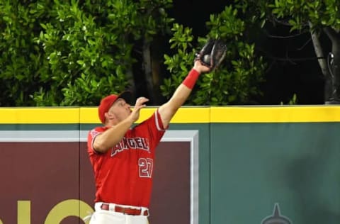 ANAHEIM, CA – JULY 27: Mike Trout #27 of the Los Angeles Angels of Anaheim makes a leaping catch at the wall as he steals a home run from Kyle Seager #15 of the Seattle Mariners in the seventh inning at Angel Stadium on July 27, 2018 in Anaheim, California. (Photo by Jayne Kamin-Oncea/Getty Images)