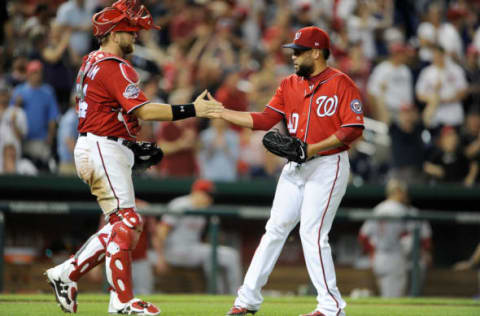 WASHINGTON, DC – AUGUST 04: Kelvin Herrera #40 of the Washington Nationals celebrates with Spencer Kieboom #64 after a 6-2 victory against the Cincinnati Reds during game two of a doubleheader at Nationals Park on August 4, 2018 in Washington, DC. (Photo by Greg Fiume/Getty Images)