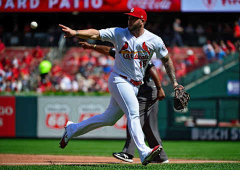 ST LOUIS, MO – SEPTEMBER 12: Matt Adams #15 of the St. Louis Cardinals back hands the ball for the force out during the fifth inning against the Pittsburgh Pirates at Busch Stadium on September 12, 2018 in St Louis, Missouri. (Photo by Jeff Curry/Getty Images)