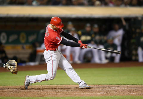 OAKLAND, CA – SEPTEMBER 18: Andrelton Simmons #2 of the Los Angeles Angels hits a single that scored two runs in the sixth inning against the Oakland Athletics at Oakland Alameda Coliseum on September 18, 2018 in Oakland, California. (Photo by Ezra Shaw/Getty Images)