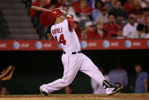 Mike Napoli takes a huge swing for the Angels. (Photo by Stephen Dunn/Getty Images)