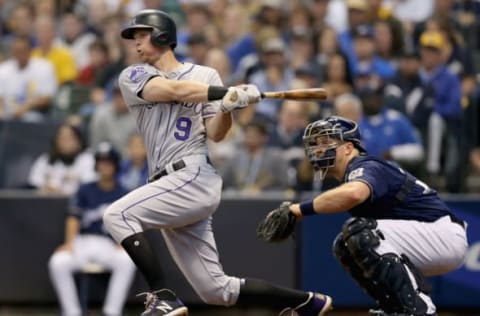 MILWAUKEE, WI – OCTOBER 05: DJ LeMahieu #9 of the Colorado Rockies hits a single during the third inning of Game Two of the National League Division Series against the Milwaukee Brewers at Miller Park on October 5, 2018 in Milwaukee, Wisconsin. (Photo by Dylan Buell/Getty Images.