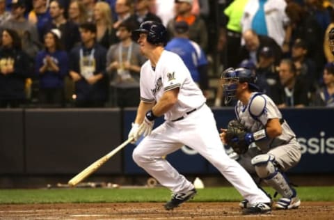 MILWAUKEE, WI – OCTOBER 19: Erik Kratz #15 of the Milwaukee Brewers hits an RBI single to score Mike Moustakas #18 against Hyun-Jin Ryu #99 of the Los Angeles Dodgers during the first inning in Game Six of the National League Championship Series at Miller Park on October 19, 2018 in Milwaukee, Wisconsin. (Photo by Jonathan Daniel/Getty Images)