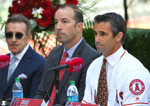 ANAHEIM, CA – OCTOBER 22: Owner Arte Moreno and general manager Billy Eppler look on as Brad Ausmus, new manager of the Los Angeles Angels of Anaheim answers questions during a press conference at Angel Stadium on October 22, 2018 in Anaheim, California. (Photo by Jayne Kamin-Oncea/Getty Images)