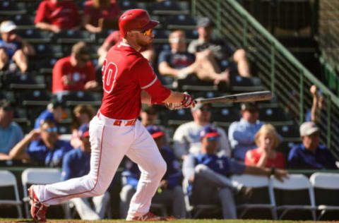 TEMPE, ARIZONA – FEBRUARY 28: Jonathan Lucroy #20 of the Los Angeles Angels singles against the Texas Rangers during the spring training game at Tempe Diablo Stadium on February 28, 2019 in Tempe, Arizona. (Photo by Jennifer Stewart/Getty Images)