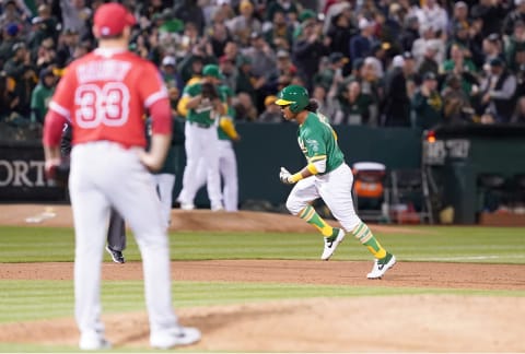 OAKLAND, CA – MARCH 29: Khris Davis #2 of the Oakland Athletics celebrates as he trots around the bases after hitting a two-run homer off of Matt Harvey #33 of the Los Angeles Angels of Anaheim in the bottom of the six inning of a Major League Baseball game at Oakland-Alameda County Coliseum on March 29, 2019 in Oakland, California. (Photo by Thearon W. Henderson/Getty Images)