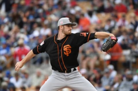 GLENDALE, ARIZONA – MARCH 11: Chris Stratton #34 of the San Francisco Giants delivers a first inning pitch during a spring training game against the Los Angeles Dodgers at Camelback Ranch on March 11, 2019 in Glendale, Arizona. (Photo by Norm Hall/Getty Images)