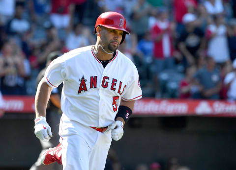 ANAHEIM, CA – APRIL 06: Albert Pujols #5 of the Los Angeles Angels of Anaheim rounds the bases after hitting a solo home run in the seventh inning of the game against the Texas Rangers at Angel Stadium of Anaheim on April 6, 2019 in Anaheim, California. (Photo by Jayne Kamin-Oncea/Getty Images)