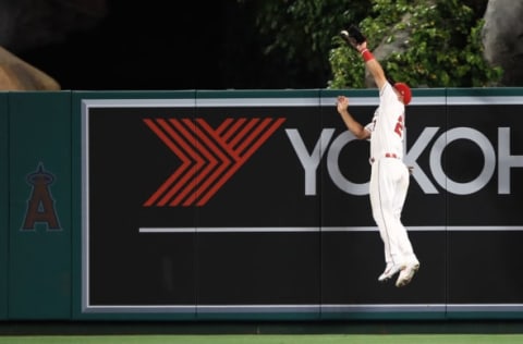 ANAHEIM, CALIFORNIA – APRIL 08: Mike Trout #27 of the Los Angeles Angels catches a fly ball hit by Christian Yelich #22 of the Milwaukee Brewers during the second inning of a game at Angel Stadium of Anaheim on April 08, 2019 in Anaheim, California. (Photo by Sean M. Haffey/Getty Images)