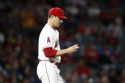 ANAHEIM, CALIFORNIA – APRIL 09: Matt Harvey #33 of the Los Angeles Angels of Anaheim looks on after allowing a homerun by Yasmani Grandal #10 of the Milwaukee Brewers during the fourth inning of a game at Angel Stadium of Anaheim on April 09, 2019 in Anaheim, California. (Photo by Sean M. Haffey/Getty Images)