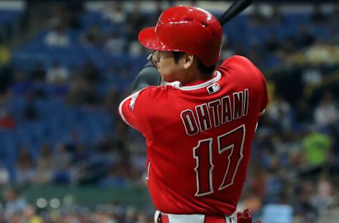 ST. PETERSBURG, FL – JUNE 13: Shohei Ohtani #17 of the Los Angeles Angels follows through on his single in the seventh inning of a baseball game against the Tampa Bay Rays at Tropicana Field on June 13, 2019 in St. Petersburg, Florida. (Photo by Mike Carlson/Getty Images)