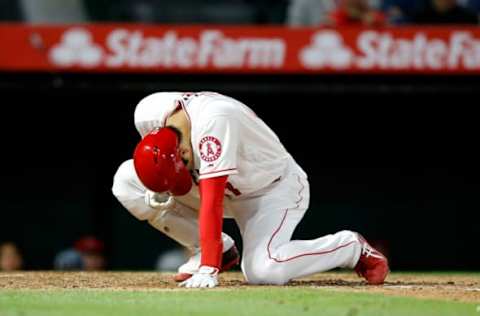 ANAHEIM, CALIFORNIA – MAY 20: Shohei Ohtani #17 of the Los Angeles Angels of Anaheim reacts to injuring his hand as he strikes out during the eighth inning of a game against the Minnesota Twins at Angel Stadium of Anaheim on May 20, 2019 in Anaheim, California. (Photo by Sean M. Haffey/Getty Images)