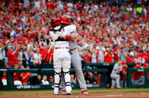 ST LOUIS, MO – JUNE 21: Former St. Louis Cardinal Albert Pujols #5 of the Los Angeles Angels of Anaheim hugs former teammate Yadier Molina #4 of the St. Louis Cardinals prior to his at-bat in his first return to Busch Stadium on June 21, 2019 in St Louis, Missouri. (Photo by Dilip Vishwanat/Getty Images)