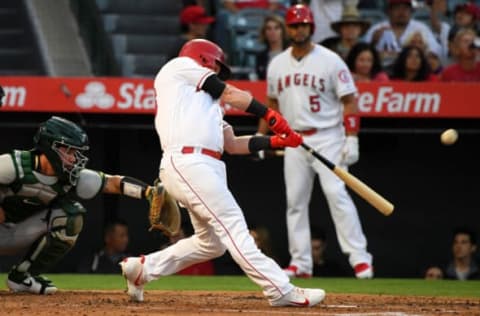 ANAHEIM, CA – JUNE 27: Kole Calhoun #56 of the Los Angeles Angels hits a two run home run in the second inning of the game against the Oakland Athletics at Angel Stadium of Anaheim on June 27, 2019 in Anaheim, California. (Photo by Jayne Kamin-Oncea/Getty Images)