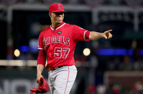 ARLINGTON, TEXAS – JULY 02: Hansel Robles #57 of the Los Angeles Angels reacts after beating the Texas Rangers 9-4 at Globe Life Park in Arlington on July 02, 2019 in Arlington, Texas. (Photo by Tom Pennington/Getty Images)