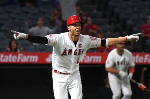 ANAHEIM, CA – SEPTEMBER 26: Andrelton Simmons #2 of the Los Angeles Angels celebrates as he runs to first after hitting a RBI single to score the winning run in the 12th inning of the game against the Houston Astros at Angel Stadium on September 26, 2019 in Anaheim, California. (Photo by Jayne Kamin-Oncea/Getty Images)