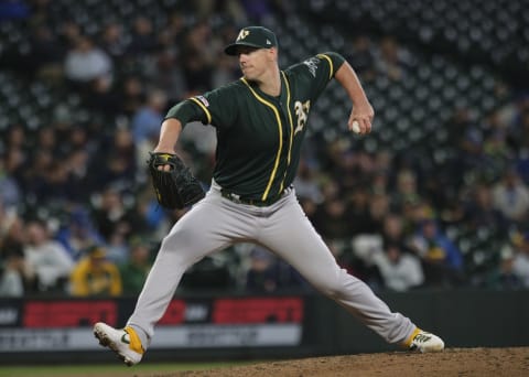 SEATTLE, WA – SEPTEMBER 29: Reliever Ryan Buchter #52 of the Oakland Athletics delivers pitch during a game against the Seattle Mariners at T-Mobile Park on September 29, 2019 in Seattle, Washington. The Mariners won 3-1. (Photo by Stephen Brashear/Getty Images)