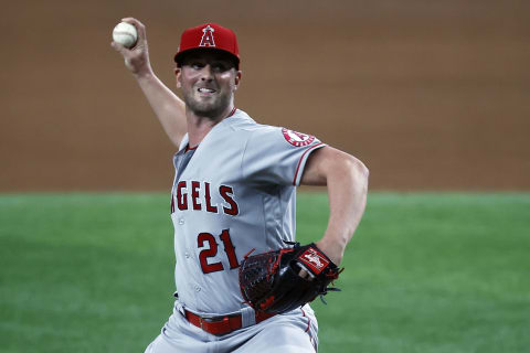 ARLINGTON, TEXAS – APRIL 28: Mike Mayers #21 of the Los Angeles Angels pitches against the Texas Rangers in the bottom of the eighth inning at Globe Life Field on April 28, 2021 in Arlington, Texas. (Photo by Tom Pennington/Getty Images)