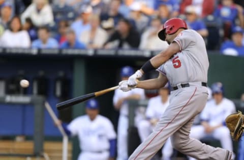 KANSAS CITY, MO – MAY 24: Albert Pujols #5 of the Los Angeles Angels of Anaheim hits a single in the third inning against the Kansas City Royals at Kauffman Stadium on May 24, 2012 in Kansas City, Missouri. (Photo by Ed Zurga/Getty Images)