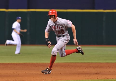 ST. PETERSBURG, FL – AUGUST 27: Outfielder Peter Bourjos #25 of the Los Angeles Angels runs to third base against the Tampa Bay Rays August 27, 2013 at Tropicana Field in St. Petersburg, Florida. The Angels won 6 – 5. (Photo by Al Messerschmidt/Getty Images)