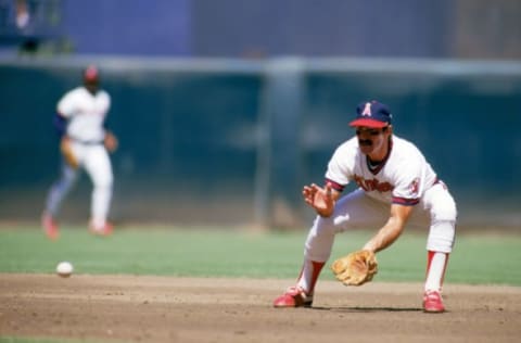 ANAHEIM, CA – 1985: Infielder Bobby Grich #4 of the California Angels fields a grounder during a 1985 season game at Angel Stadium in Anaheim, California. (Photo by Rick Stewart/Getty Images)