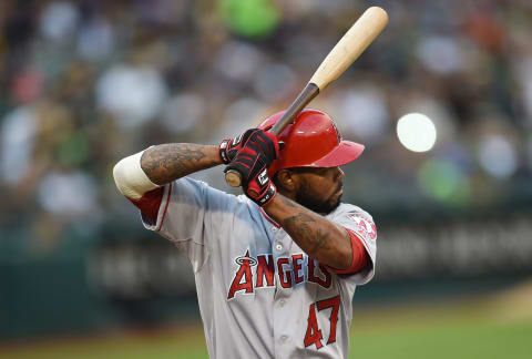 OAKLAND, CA – AUGUST 22: Howie Kendrick #47 of the Los Angeles Angels of Anaheim bats against the Oakland Athletics in the top of the first inning at O.co Coliseum on August 22, 2014 in Oakland, California. (Photo by Thearon W. Henderson/Getty Images)