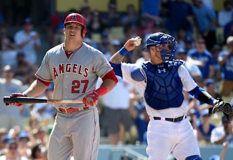 LOS ANGELES, CA – AUGUST 01: Mike Trout #27 of the Los Angeles Angels reacts after his strikeout in front of of Yasmani Grandal #9 of the Los Angeles Dodgers during the ninth inning at Dodger Stadium on August 1, 2015 in Los Angeles, California. (Photo by Harry How/Getty Images)