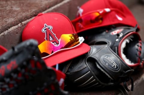 ANAHEIM, CA – APRIL 09: A detail view of Los Angeles Angels of Anaheim hats and gloves during a game against the Seattle Mariners at Angel Stadium of Anaheim on April 9, 2017 in Anaheim, California. (Photo by Sean M. Haffey/Getty Images)