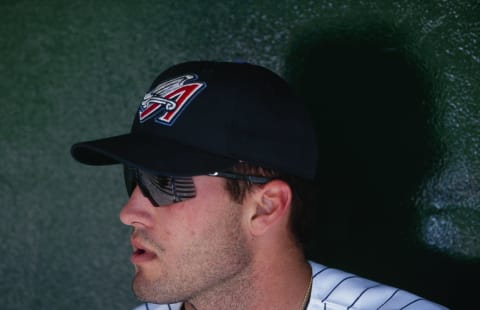 ANAHEIM, CA – MAY 3: Troy Glaus #25 of the Anaheim Angels looks on from the dugout during their game against the Los Angeles Dodgers at Edison Field on Mat 3, 2000 in Anaheim, California. The Dodgers defeated the Angels 8-3. (Photo by Harry How/Getty Images)