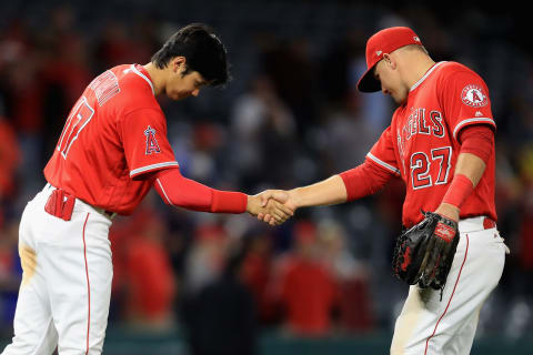 ANAHEIM, CA – MAY 10: Shohei Ohtani #17 shakes hands with Mike Trout #27 of the Los Angeles Angels of Anaheim after defeating the Minnesota Twins 7-4 in a game at Angel Stadium on May 10, 2018 in Anaheim, California. (Photo by Sean M. Haffey/Getty Images)