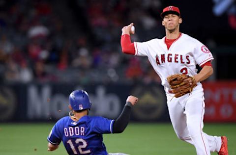 ANAHEIM, CA – JUNE 01: Andrelton Simmons #2 of the Los Angeles Angels turns a double play as Rougned Odor #12 of the Texas Rangers slides at second base to end the game during the ninth inning at Angel Stadium on June 1, 2018 in Anaheim, California. Angels won 6-0. (Photo by Harry How/Getty Images)