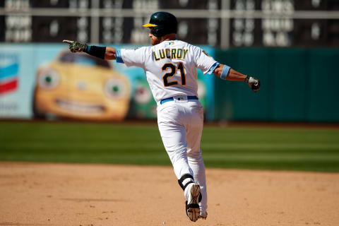 OAKLAND, CA – JUNE 17: Jonathan Lucroy #21 of the Oakland Athletics celebrates after hitting a walk off single against the Los Angeles Angels of Anaheim during the eleventh inning at the Oakland Coliseum on June 17, 2018 in Oakland, California. The Oakland Athletics defeated the Los Angeles Angels of Anaheim 6-5 in 11 innings. (Photo by Jason O. Watson/Getty Images)