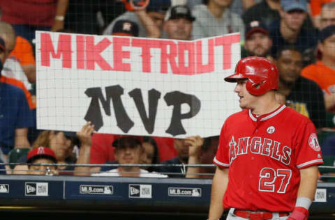 HOUSTON, TX – SEPTEMBER 24: A Los Angeles Angels of Anaheim fan holds up a sign as Mike Trout