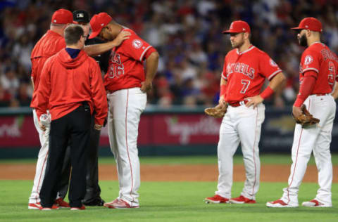 ANAHEIM, CA – JUNE 29: Manager Mike Scioscia talks with JC Ramirez