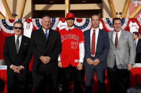 ANAHEIM, CA – DECEMBER 09: (L-R) Owner Arte Moreno, Manager Mike Scioscia, Shohei Ohtani, General Manager Billy Eppler and President John Carpino pose for the media after a press conference introducing Shohei Ohtani to the Los Angeles Angels of Anaheim at Angel Stadium of Anaheim on December 9, 2017 in Anaheim, California. (Photo by Josh Lefkowitz/Getty Images)